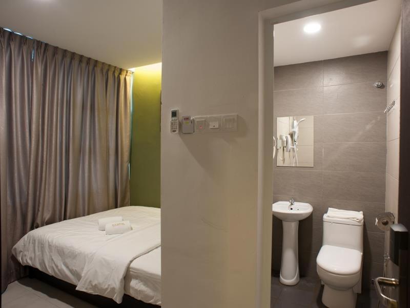 Econtel Queensbay Sungai Dua Bukit Dış mekan fotoğraf